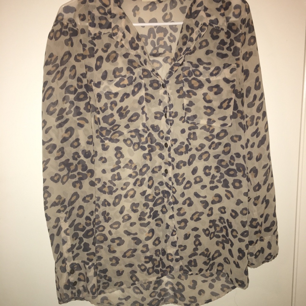Leslie’s print sheer button down blouse